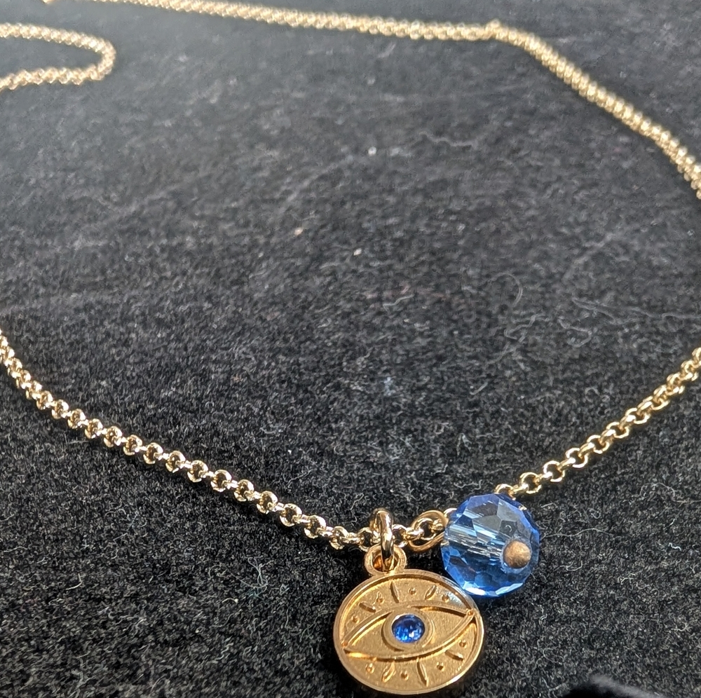 Gold Finish Evil Eye Adjustable Necklace with Blue Crystal Charm